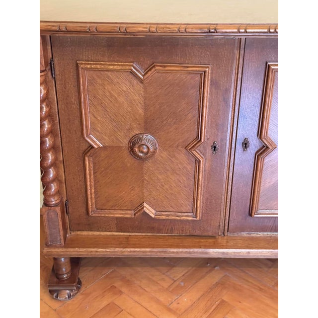 Beautiful early 20th-century Spanish-style oak chest, crafted from solid oak with intricate detailing. This timeless piece...