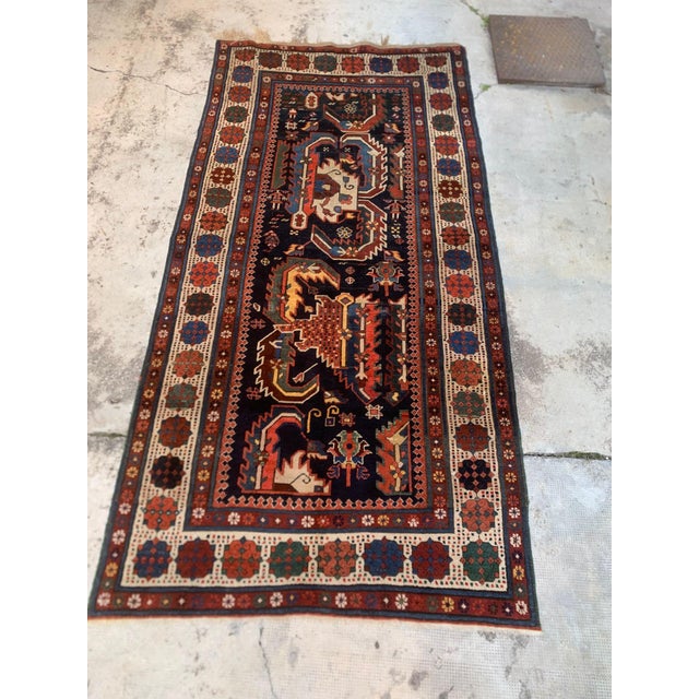Antique Talish dragon rug from the southeastern Caucasus, circa 1870, hand-knotted in wool. The dark field features large...