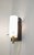 Vintage Mid-Century Modern wall lamp made in Italy in the 1950s and 1960s, commonly attributed to or created in the style...
