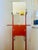 Striking sculptural valet stand in the form of a stylized “robot” figure, blending functional design with playful...