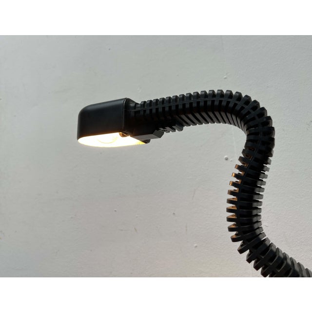 Space Age Cobra table lamp, designed by Masayuki Kurokawa in the 1970s. This design reflects the prevailing design trends...