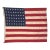 This large vintage American flag is made from a cotton cloth, with 48 embroidered stars and 13 sewn stripes. Please note...