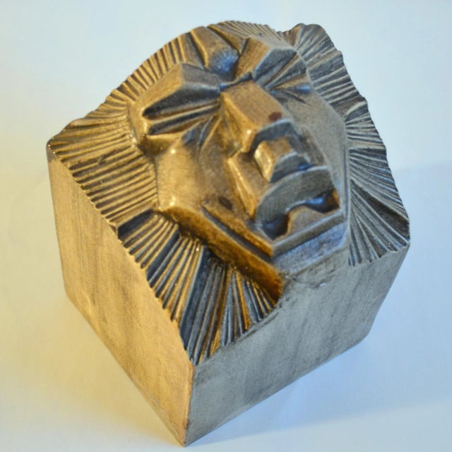 Two original Art Deco ceramic bookends depicting lion heads, attributed to Jan Schonk who designed for Royal pottery...
