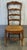 Habersham ladder-back chairs are classic examples of European farmhouse design. Chairs feature elegantly carved crest...