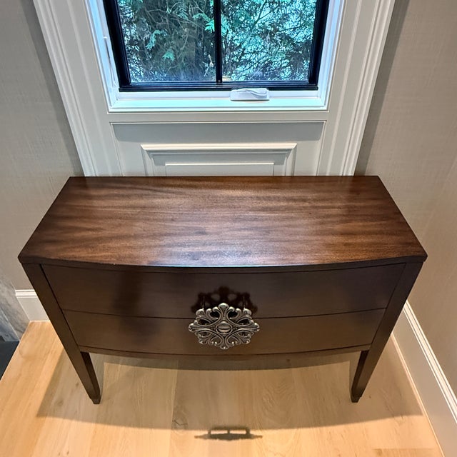 Hooker Furniture Melange Medallion Console—two available A walnut two drawer console or server with a dramatic medallion...