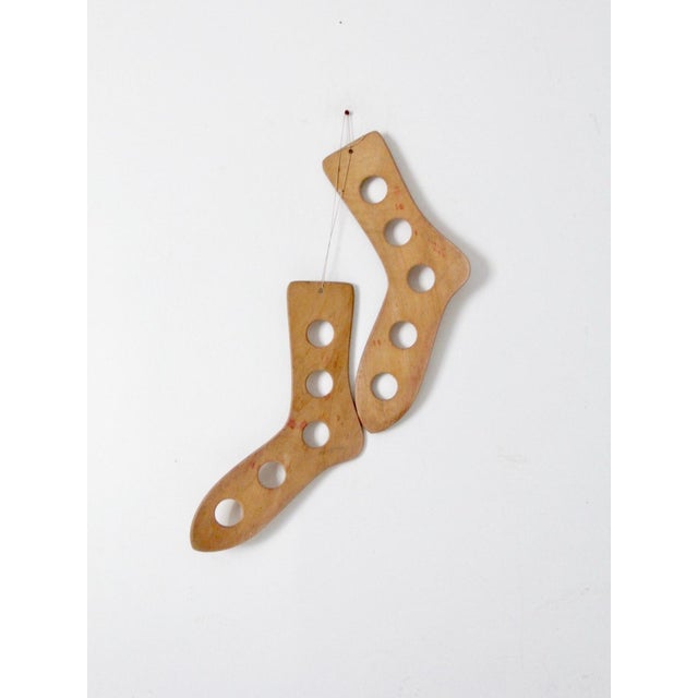 This pair of antique wooden sock stretchers adds a collected, designer touch to both seasonal and year-round interiors....