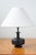 Brutalist table lamp designed and made in Scandinavia. Made during the 1950-60s. Solid rough surfaced cast iron lamp base...