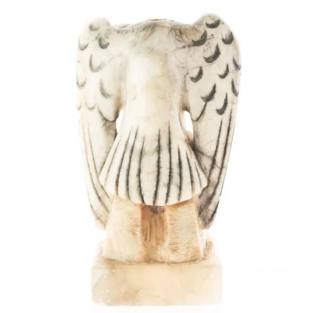 A prized discovery for antique lovers, this art deco hand carved alabaster eagle sculpture adds a distinct flair to any...