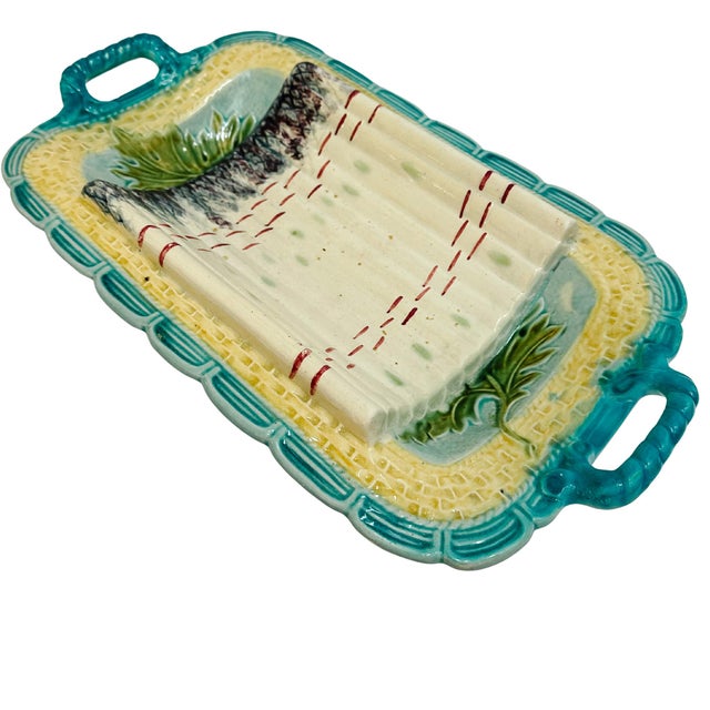 Sourced directly from Paris, this exquisite antique French Majolica (Barbotine) asparagus platter is a masterclass in...