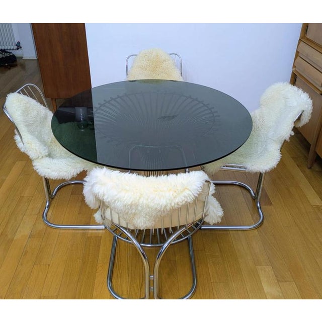 Splendid set of 4 radiofreccia chairs and a margot table, designed by gastone rinaldi and produced by rima in 1968. Each...