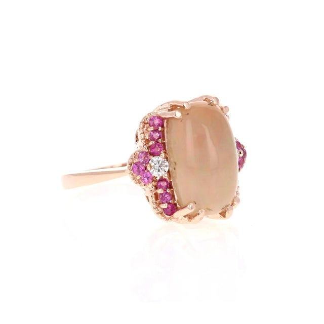 3.62 Carat Oval Cut Opal Diamond Rose Gold Ring The Oval Cut Opal in this ring weighs 3.19 carats and the measurements of...