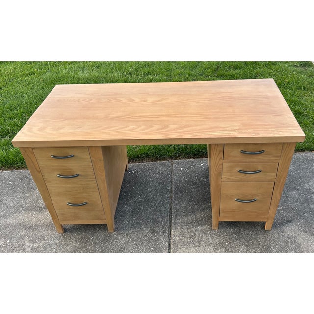 Vintage (1990's) Computer/Writing Desk has a Transitional Style. Made by Ethan Allen. The Wood is Oak. The Desk has The...