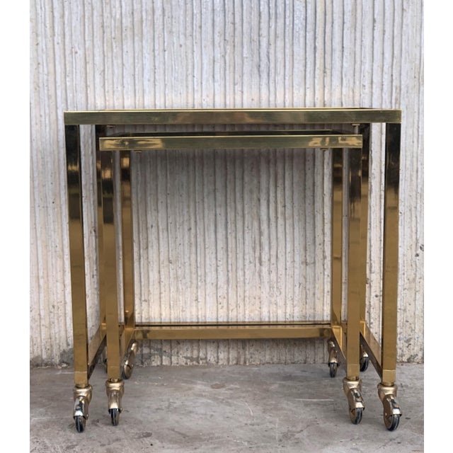 Nesting Tables Italian Design 1970 in Brass With Smoked Glass and Wheels - a Pair For Sale - Image 6 of 11