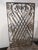 Wrought iron decorative panels like this have a long history, often used as architectural elements in gardens, balconies,...