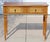 This striking Italian Florentine-style console table showcases the charm and artistry of traditional European...