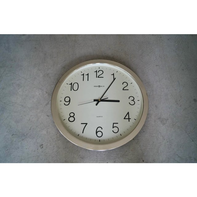 Vintage Midcentury Modern clock for sale. Manufactured in the 1970's by Howard Miller, and in great condition. It's in...