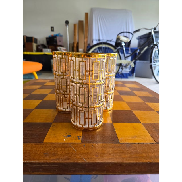 Set of 7 1960's shoji highball glasses with 22kt gold trellis detailing.