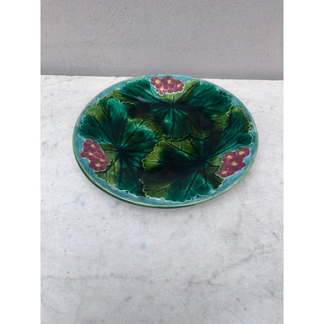 19th Century Majolica pink flowers plate signed Clairefontaine.
