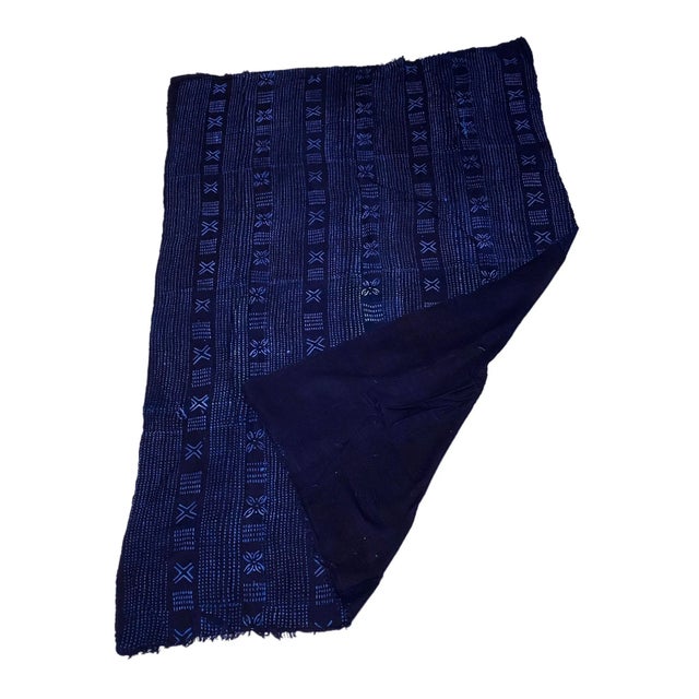 This fabric is woven by the skilled hands of the Mossi people in Burkina Faso. It is a rare and unique traditional...