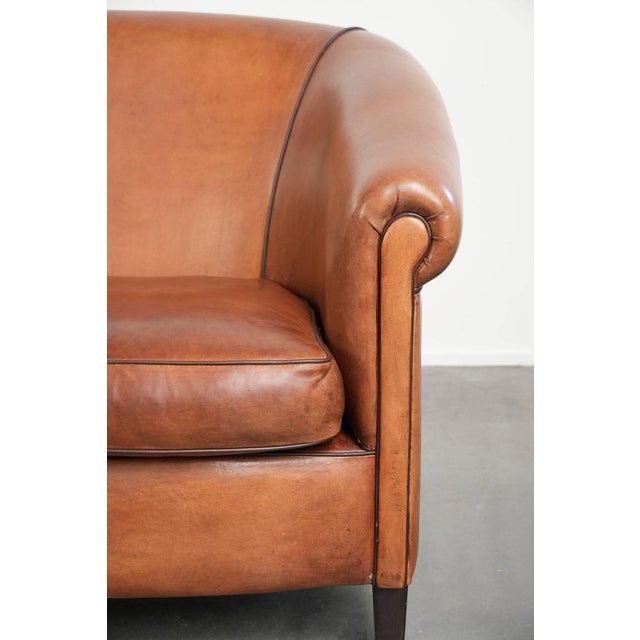 Sheepskin 2-Seater Sofa with Warm Cognac Brown Color Scheme and Finish with Black Piping For Sale - Image 9 of 15