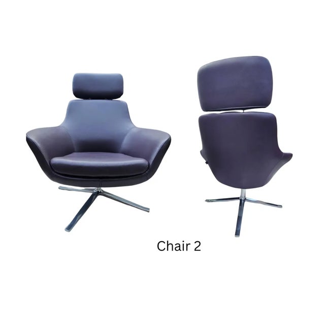 Pair of leather swivel lounge chairs, Coalesse by Steelcase These chairs are top-grain leather in a rich aubergine/plum...