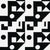 A stylish study of geometric shapes, this graphic, black-and-white pattern by Porter Teleo is densely embroidered on a...