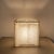 - Table lamp formed by a Acrylic Glass cube double wall in which small granules are inserted - in chromium-plated metal...