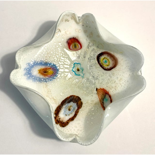 1950s Murano decorative blown glass tutti frutti bowl filled with multi colored canes, silver flakes and a ruffled rim....