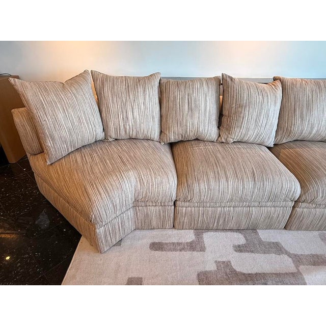 This rare 7-piece vintage sectional by Brueton is a striking example of postmodern luxury and sculptural comfort. With...