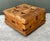 This vintage rustic storage coffee table is crafted from solid wood and accented with aged metal hardware, offering the...