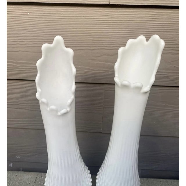 Elevate your décor with this elegant **Vintage Mid-Century Modern Fenton White Milk Glass Swung Stretch Vase Set of 2**....