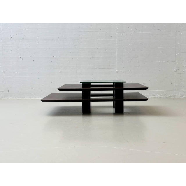 A rare coffee table by the design duo clemmer + heidsieck, featuring two generously sized shelves stacked one above the...