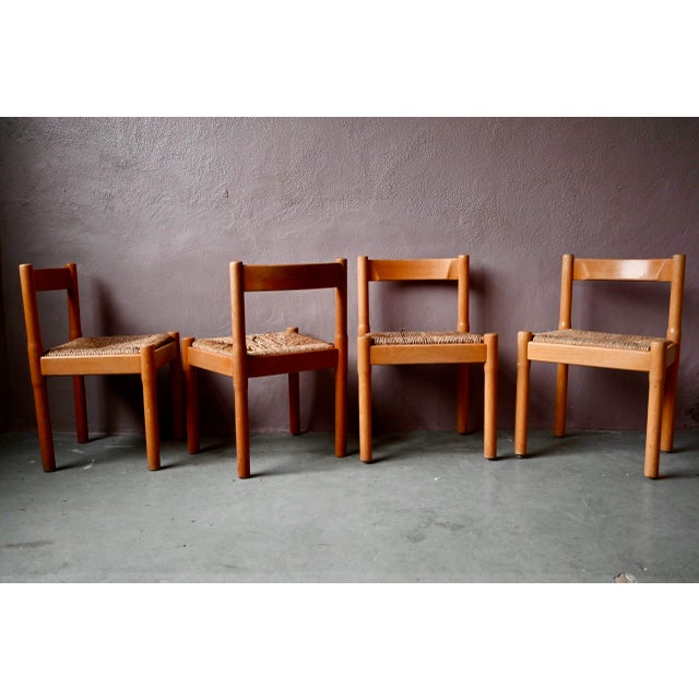 These chairs date from the 1970s and were designed by Vico Magistretti. They are made of solid elm and woven straw. The...