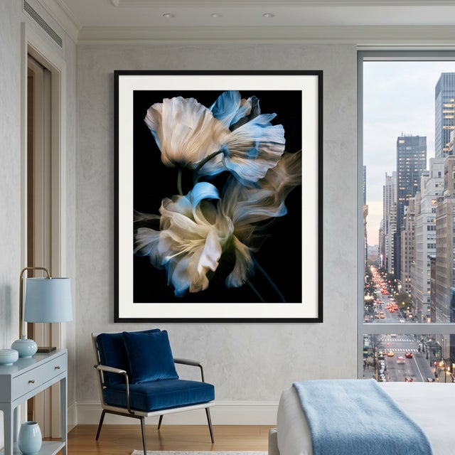 Ethereal blossoms unfold against a deep black void, their translucent petals flowing like silk in luminous shades of...