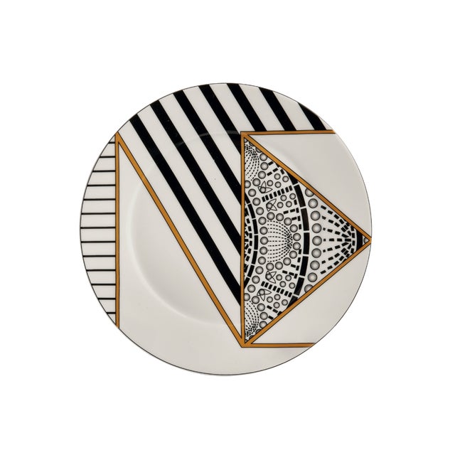 Crafted from fine porcelain, this set of four Alina Dessert Plates is defined by bold graphic lines, intricate patterning,...