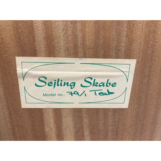 A beautifully crafted Danish modern corner shelving unit by Sejling Skabe, model 79/1, executed in warm, richly grained...