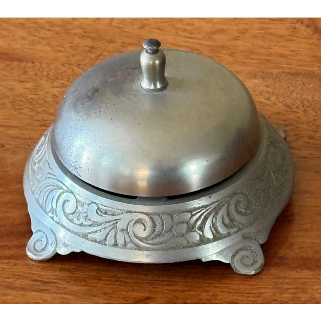 Vintage hotel counter bell with a fine tone and an Art Nouveau pattern surround.. Functions well. Please see condition...