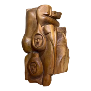 Vintage Handmade Abstract Wood Sculpture in Mid Century Modern Style With Faces Depicted.