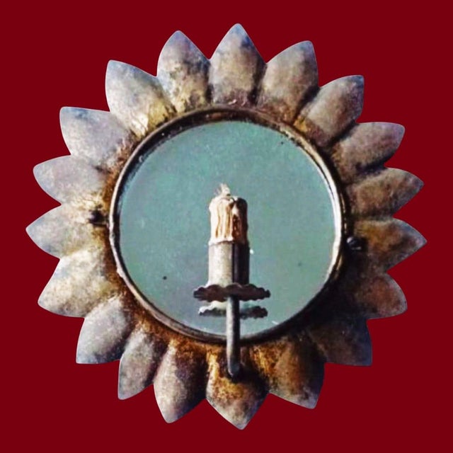 This vintage wrought iron candle holder with mirror is a unique decorative piece, perfect for those seeking a touch of...