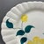 This beautiful mid-century ceramic platter was hand-painted by Blue Ridge Southern Potteries in their cheerful “Ridge...