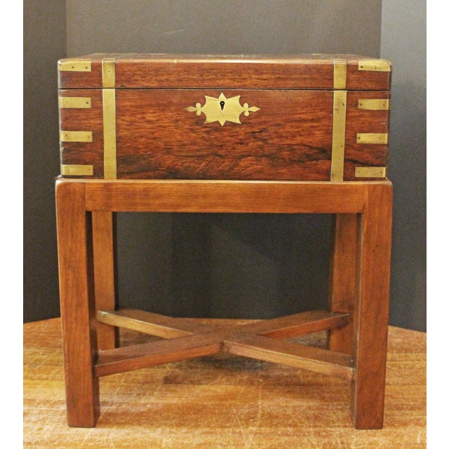 Circa 1840 lap desk box writing box on custom side table stand, English. A handsome example of rosewood with extensive...