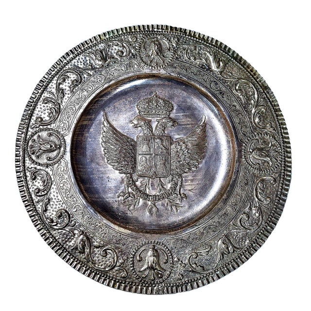On offer is a 19th-century decorative round tray or plaque with hanging hooks. It features a repoussé Russian double-...