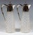 Two edward vii clear glass carafes with a conical body, elaborate steinel and octagonal cut on the outer wall, finely...