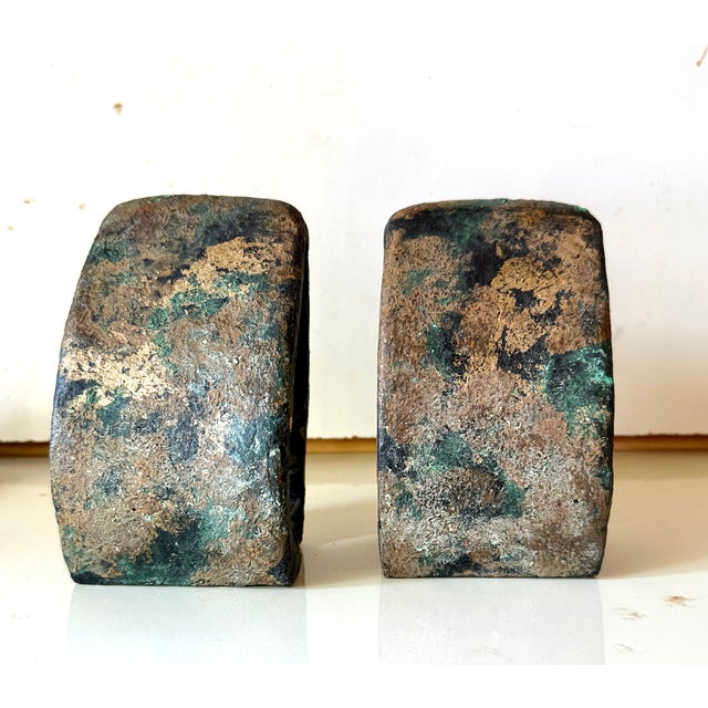 Vintage mid-century brutalist owl bookends feature a textured forged iron construction with a distressed verdigris and...