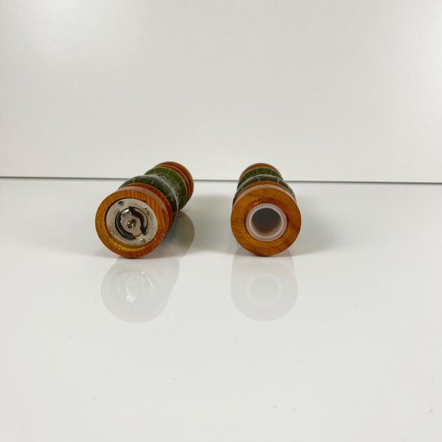 Green ceramic salt and pepper shaker set and salad servers, 1970 Wooden and ceramic handle Dimensions: Salt and pepper...