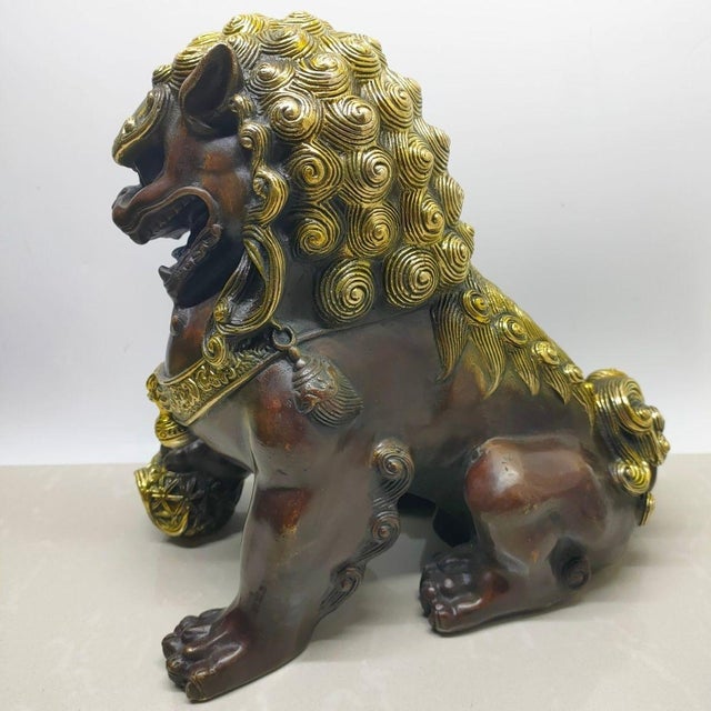 Chinese Pair of Vintage Chinese Gilt Bronze Guardian Lions (Foo Dogs) on Embroidered Balls For Sale - Image 3 of 9