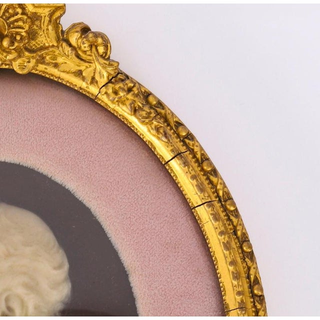 A superb pair of wax portrait reliefs by richard cockle lucas, british, 1800-1883, in convex glazed giltwood frames, circa...