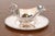 A gorgeous antique silverplate gravy boat with tray featuring gadroon borders and shell feet to boat By Tiffany & Co....