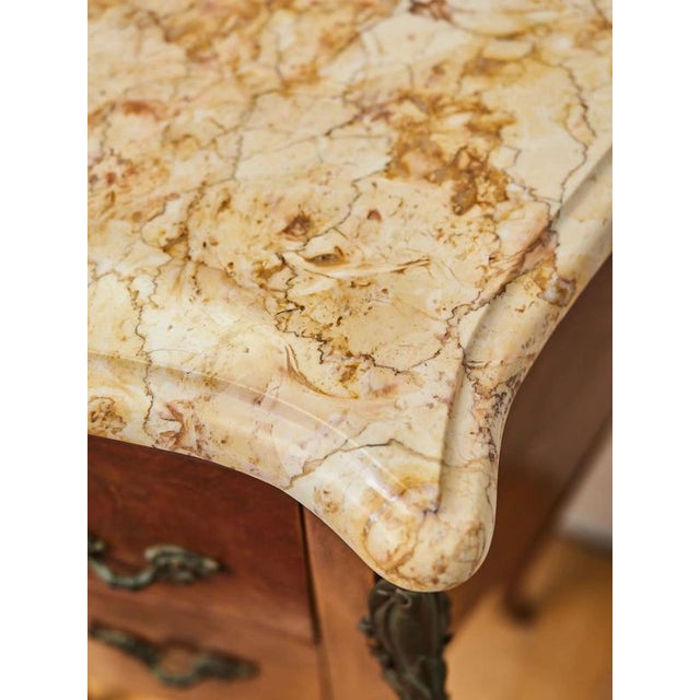 Beautiful chest of drawers / table with two drawers. The chest of drawers is decorated with plant inlay, cast bronze...