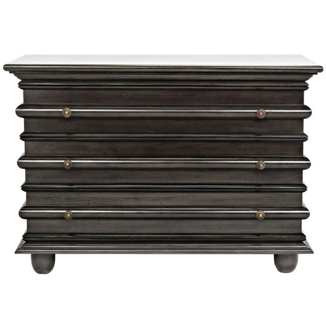 With a design inspired by the jacket of a classic first edition, this handsome, handcrafted mahogany chest features bun...